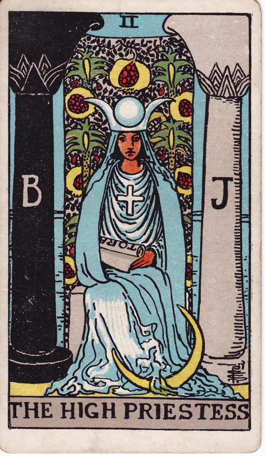 Key II — The High Priestess: Enthroned between the pillars Boaz and Jachin before the veil of the Sanctuary, holding the scroll of the Tora.